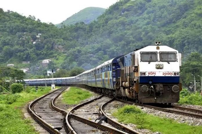 Deluxe AC Tourist Train for North East India Tour parked at station